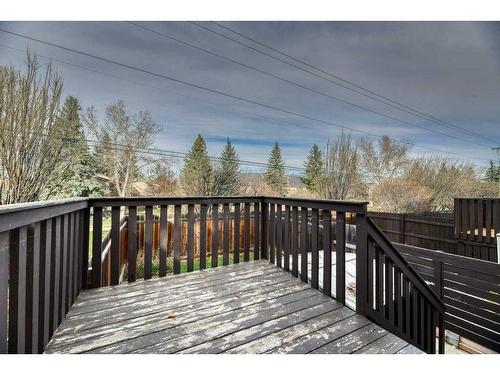 138 Oaktree Lane Sw, Calgary, AB - Outdoor With Deck Patio Veranda With Exterior