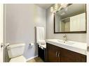 138 Oaktree Lane Sw, Calgary, AB  - Indoor Photo Showing Bathroom 