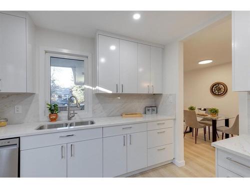 2015 46 Avenue Sw, Calgary, AB - Indoor Photo Showing Kitchen With Double Sink