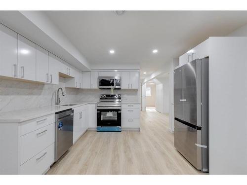 2015 46 Avenue Sw, Calgary, AB - Indoor Photo Showing Kitchen With Stainless Steel Kitchen