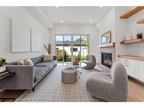 1826 19 Avenue Nw, Calgary, AB - Indoor Photo Showing Living Room With Fireplace