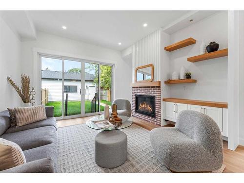 1826 19 Avenue Nw, Calgary, AB - Indoor Photo Showing Living Room With Fireplace