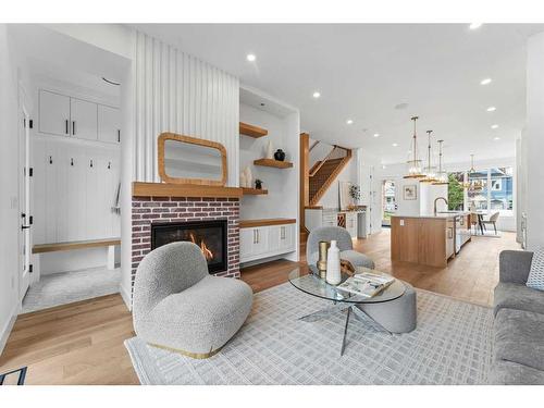 1826 19 Avenue Nw, Calgary, AB - Indoor Photo Showing Living Room With Fireplace