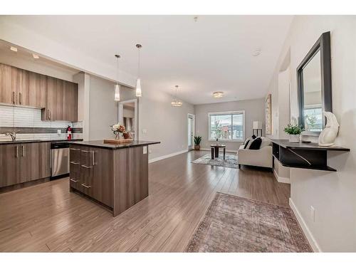 210-8 Sange  Hill Terrace Nw, Calgary, AB - Indoor Photo Showing Kitchen With Upgraded Kitchen