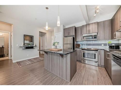 210-8 Sange  Hill Terrace Nw, Calgary, AB - Indoor Photo Showing Kitchen With Stainless Steel Kitchen With Upgraded Kitchen