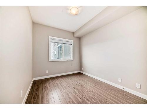 210-8 Sange  Hill Terrace Nw, Calgary, AB - Indoor Photo Showing Other Room