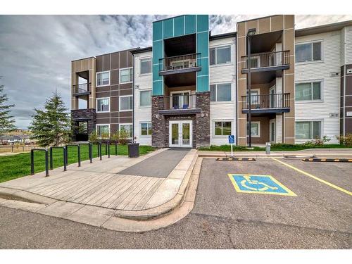 210-8 Sange  Hill Terrace Nw, Calgary, AB - Outdoor With Balcony With Facade