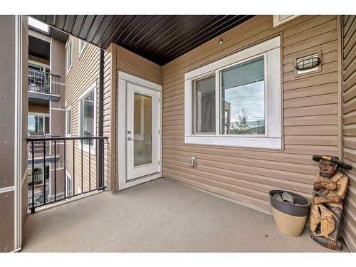 210-8 Sange  Hill Terrace Nw, Calgary, AB - Outdoor With Balcony With Exterior