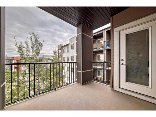 210-8 Sange  Hill Terrace Nw, Calgary, AB - Outdoor With Balcony With Exterior