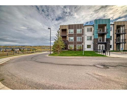 210-8 Sange  Hill Terrace Nw, Calgary, AB - Outdoor With Balcony With Facade