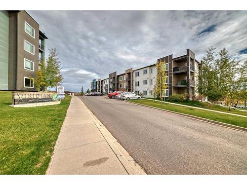 210-8 Sange  Hill Terrace Nw, Calgary, AB - Outdoor With Balcony With Facade