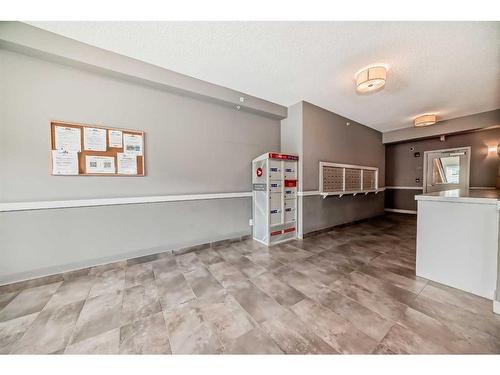 210-8 Sange  Hill Terrace Nw, Calgary, AB - Indoor Photo Showing Kitchen