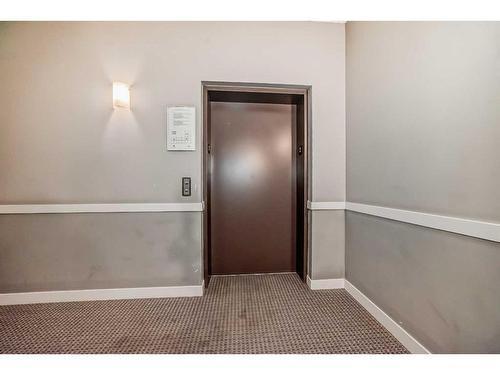 210-8 Sange  Hill Terrace Nw, Calgary, AB - Indoor Photo Showing Other Room