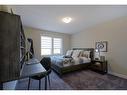 229 Creekstone Hill Sw, Calgary, AB  - Indoor Photo Showing Bedroom 