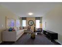 229 Creekstone Hill Sw, Calgary, AB  - Indoor Photo Showing Living Room 