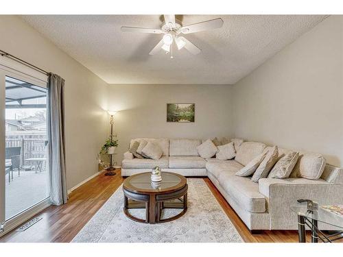 297 Queen Tamara Way Se, Calgary, AB - Indoor Photo Showing Living Room