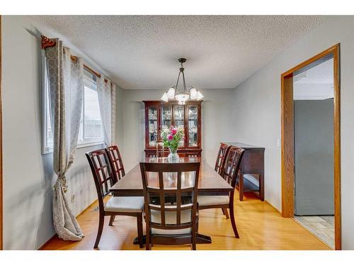 297 Queen Tamara Way Se, Calgary, AB - Indoor Photo Showing Dining Room