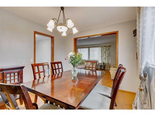 297 Queen Tamara Way Se, Calgary, AB - Indoor Photo Showing Dining Room