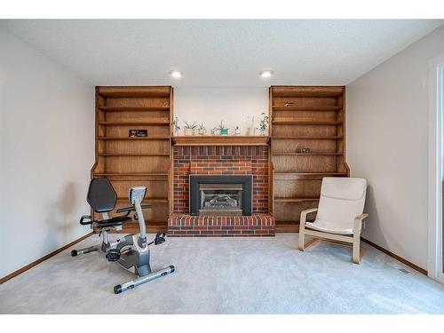 43 Edgewood Place Nw, Calgary, AB - Indoor With Fireplace