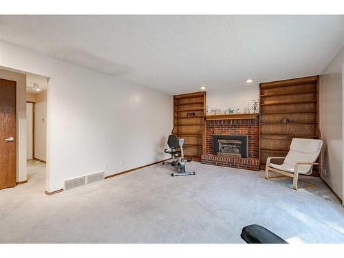 43 Edgewood Place Nw, Calgary, AB - Indoor With Fireplace