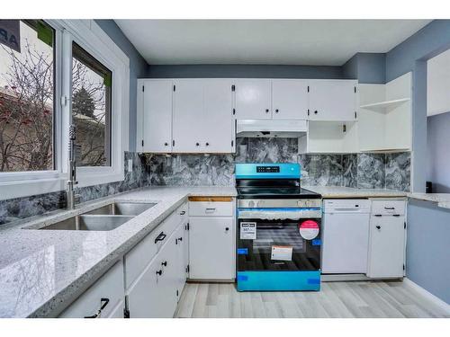 3723 7 Avenue Nw, Calgary, AB - Indoor Photo Showing Kitchen With Double Sink