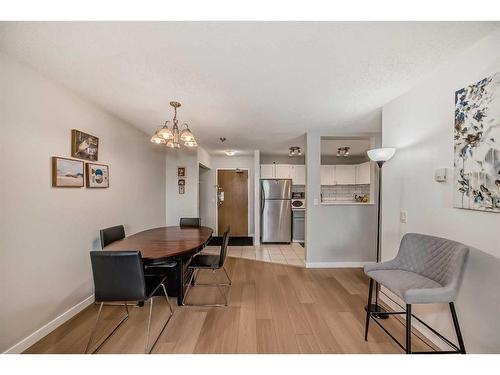 302-1712 38 Street Se, Calgary, AB - Indoor Photo Showing Dining Room