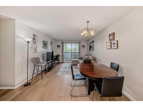 302-1712 38 Street Se, Calgary, AB - Indoor Photo Showing Dining Room