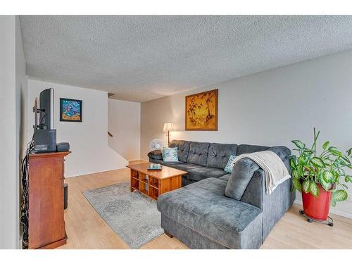 108-15403 Deer Run Drive Se, Calgary, AB - Indoor Photo Showing Living Room