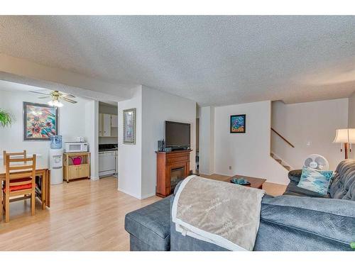 108-15403 Deer Run Drive Se, Calgary, AB - Indoor Photo Showing Living Room