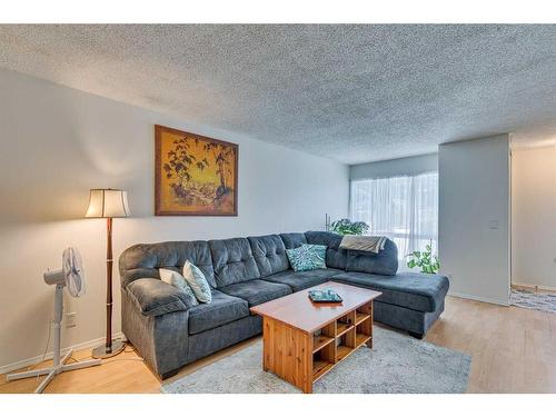 108-15403 Deer Run Drive Se, Calgary, AB - Indoor Photo Showing Living Room