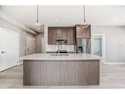 1305-111 Wolf Creek Drive SE Calgary, AB T2X 5X2