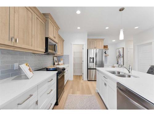 200 Wildrose Crescent, Strathmore, AB - Indoor Photo Showing Kitchen With Stainless Steel Kitchen With Double Sink With Upgraded Kitchen