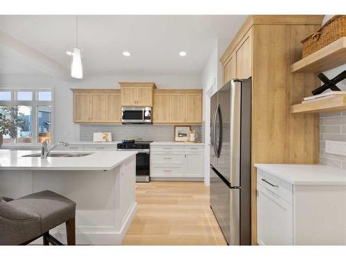 200 Wildrose Crescent, Strathmore, AB - Indoor Photo Showing Kitchen With Stainless Steel Kitchen With Double Sink