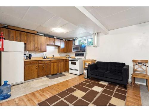 4304 58 Street Ne, Calgary, AB - Indoor Photo Showing Kitchen With Double Sink