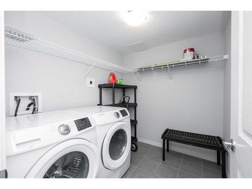 113-4150 Seton Drive Se, Calgary, AB - Indoor Photo Showing Laundry Room