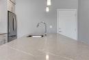 113-4150 Seton Drive Se, Calgary, AB  - Indoor Photo Showing Kitchen 