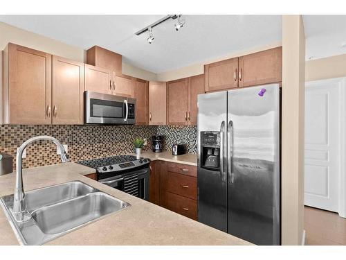 2502-1320 1 Street Se, Calgary, AB - Indoor Photo Showing Kitchen With Double Sink