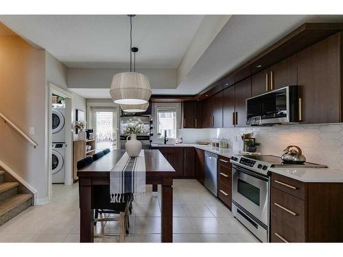 134 West Springs Road Sw, Calgary, AB - Indoor Photo Showing Kitchen With Upgraded Kitchen