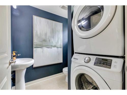 134 West Springs Road Sw, Calgary, AB - Indoor Photo Showing Laundry Room