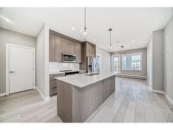 1304-111 Wolf Creek Drive SE Calgary, AB T2X 5X2