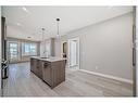 1304-111 Wolf Creek Drive Se, Calgary, AB  - Indoor Photo Showing Kitchen With Upgraded Kitchen 