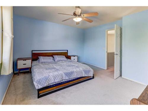 18 Covewood Circle Ne, Calgary, AB - Indoor Photo Showing Bedroom