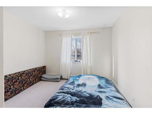 2301-20 Harvest Rose Park Ne, Calgary, AB - Indoor Photo Showing Bedroom