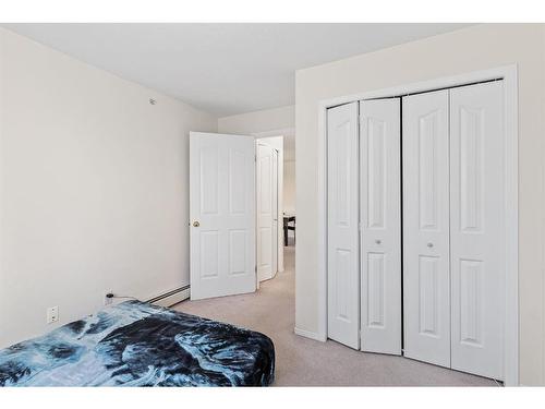 2301-20 Harvest Rose Park Ne, Calgary, AB - Indoor Photo Showing Bedroom