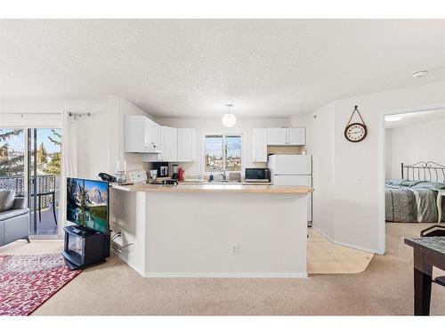 2301-20 Harvest Rose Park Ne, Calgary, AB - Indoor Photo Showing Kitchen