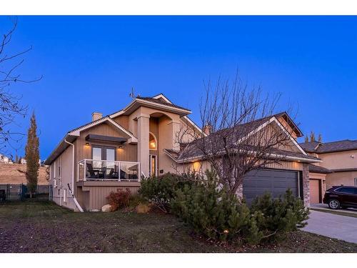 251 Gleneagles View, Cochrane, AB - Outdoor With Deck Patio Veranda