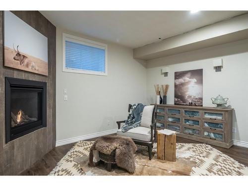 251 Gleneagles View, Cochrane, AB - Indoor With Fireplace