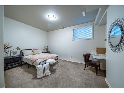 251 Gleneagles View, Cochrane, AB - Indoor Photo Showing Bedroom