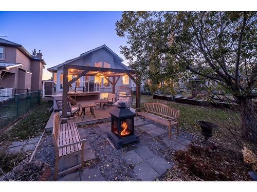 251 Gleneagles View, Cochrane, AB - Outdoor With Deck Patio Veranda