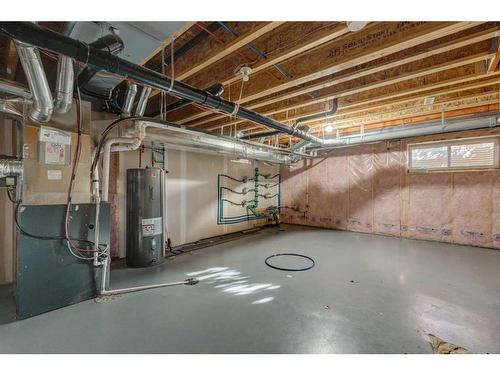 87 West Coach Manor Sw, Calgary, AB - Indoor Photo Showing Basement